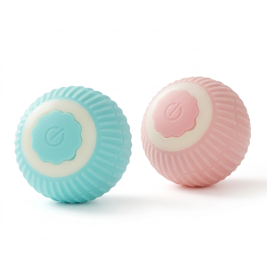 Two pastel pink and aqua ribbed smart rolling cat balls on white background