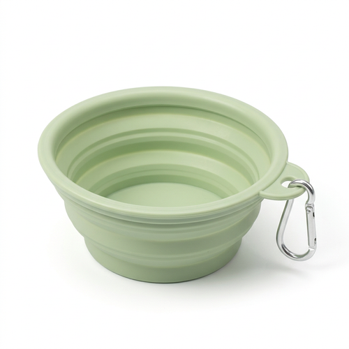 Single expanded sage green collapsible pet bowl with silver clip on white background