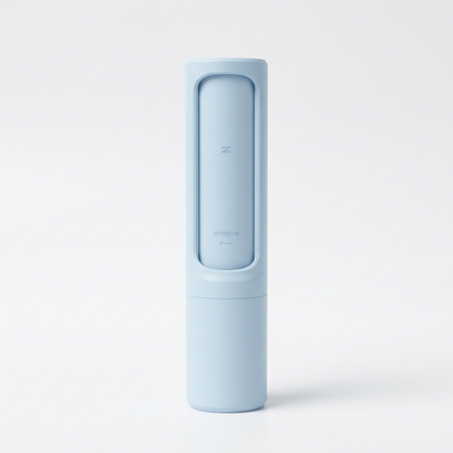Single pastel blue pet hair lint remover on white background
